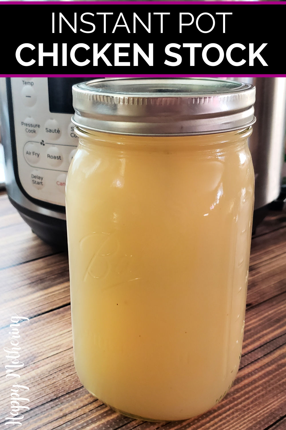 Quart sized jar of chicken stock in front of Instant Pot on wood table.
