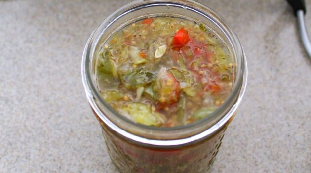 Sweet pickle relish packed into a pint jar with ¼ inch of headspace.