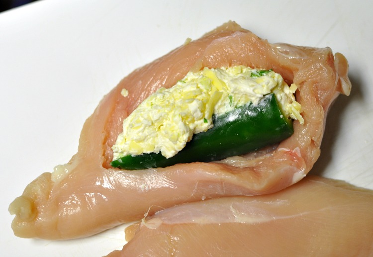 Jalapeno popper tucked into pocket cut in side of chicken breast