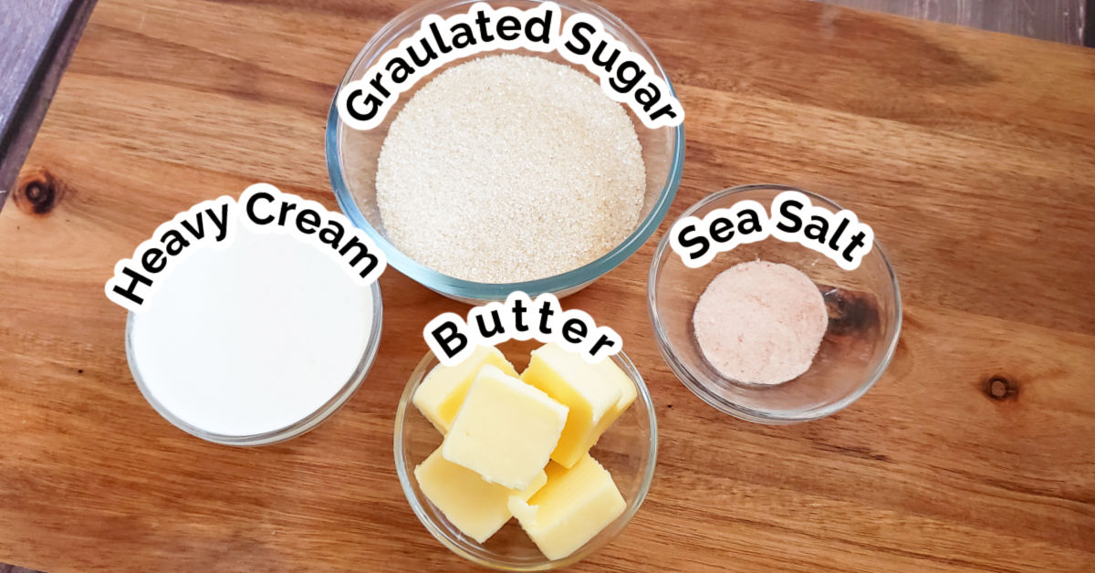 Granulated sugar, heavy cream, butter and sea salt in small bowls.
