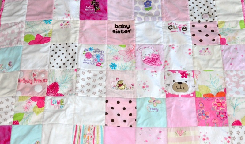 Baby clothes quilt.
