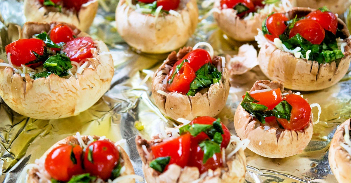 Large button mushrooms stuffed with caprese ingredients.