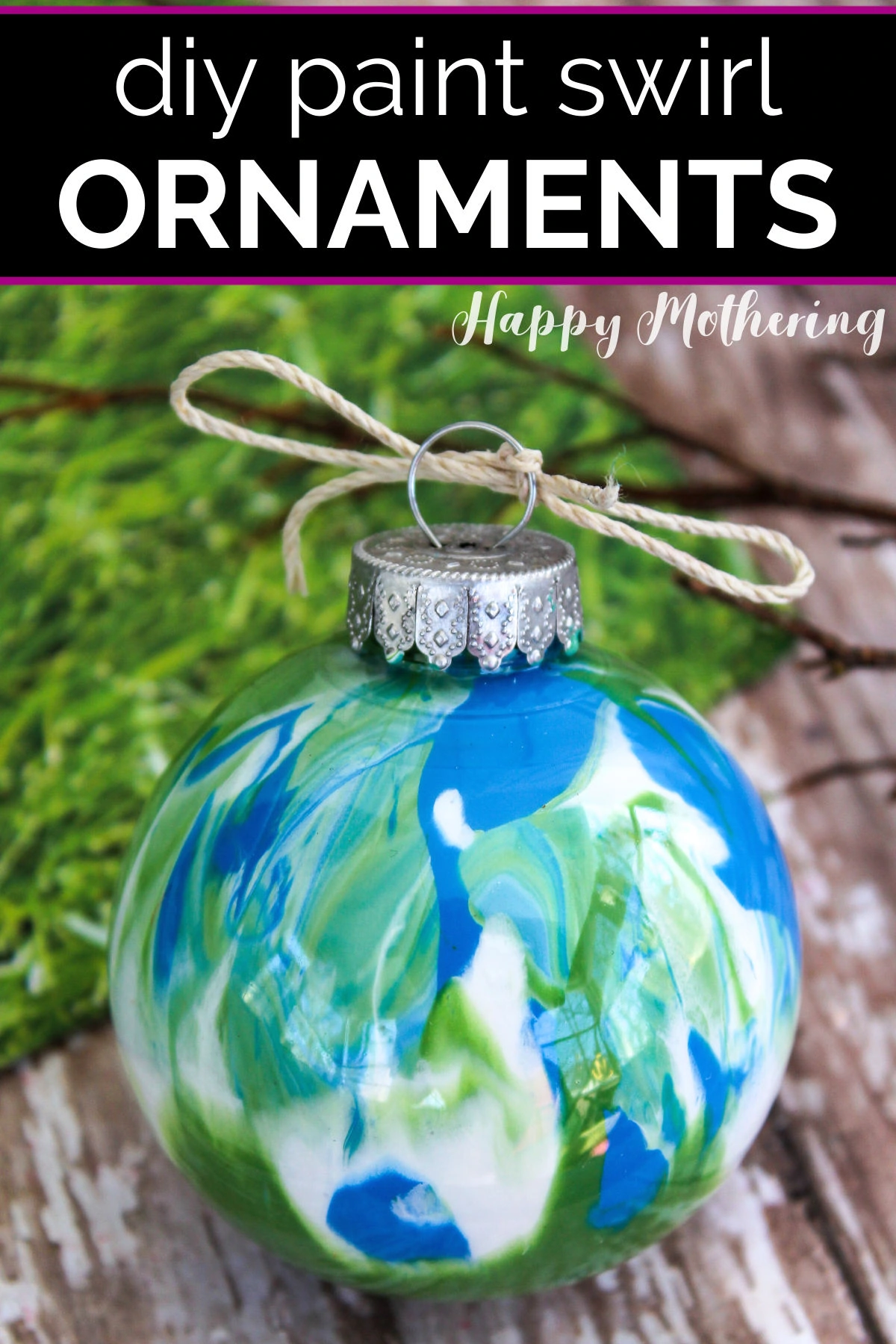 Completed paint swirl ornament with green, blue and white acrylic paint.