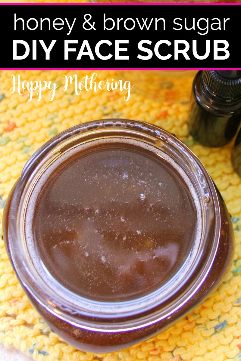 Close up of honey and brown sugar face scrub in half pint mason jar on yellow cloth