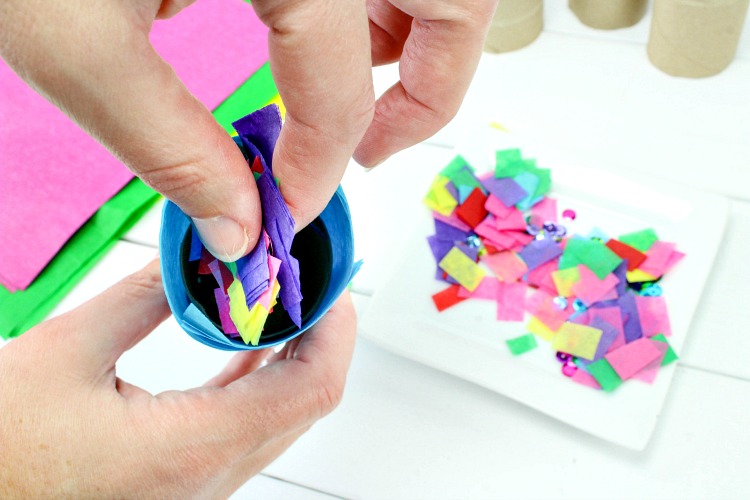 Add the confetti to the DIY party popper