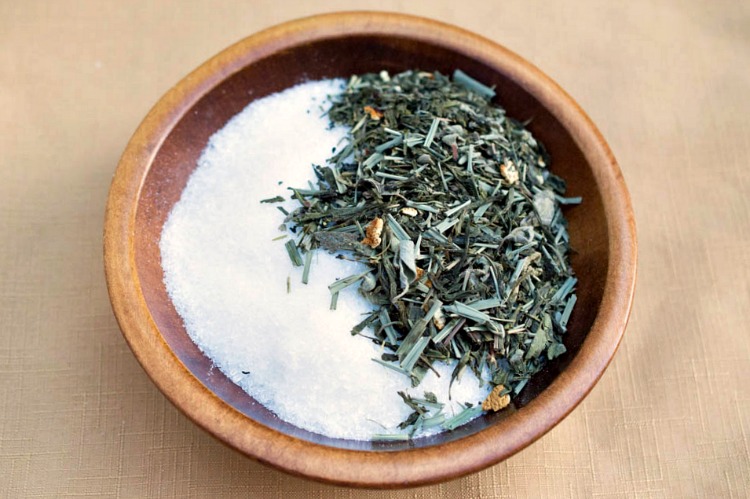Epsom salt and tea leaves in a wood bowl