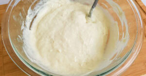 Gluten free chicken pot pie crust being made in a glass bowl.