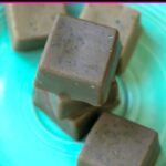Homemade matcha green tea powder soap bars stacked together