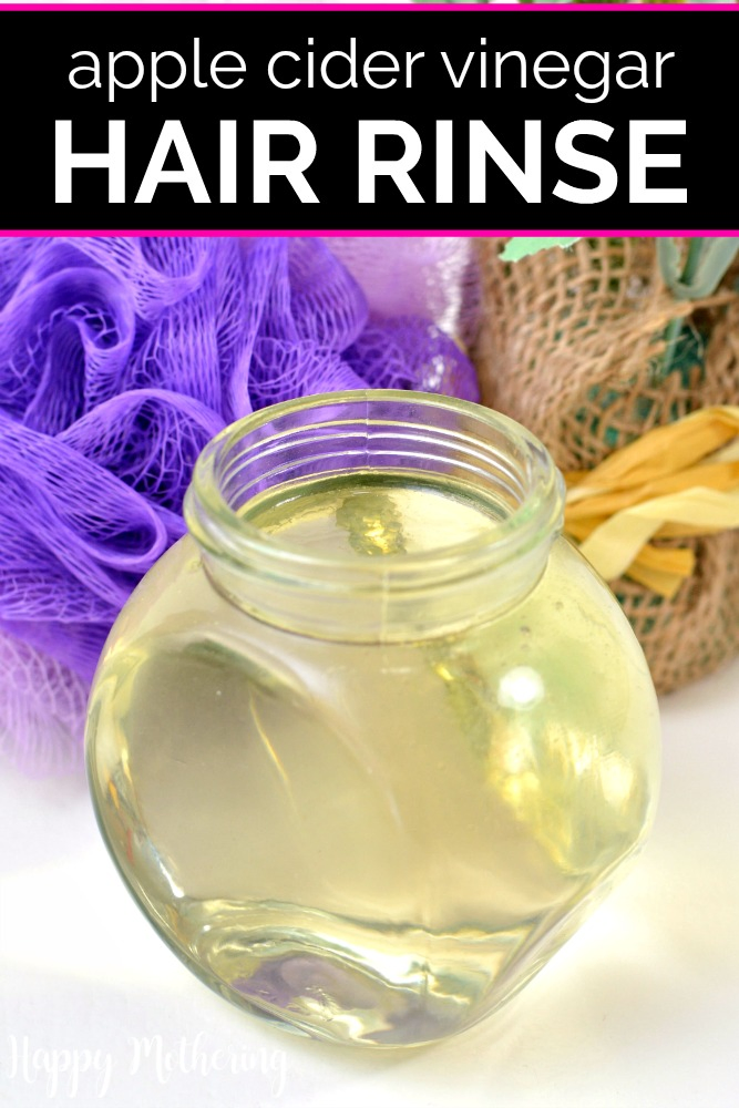 Apple cider vinegar hair rinse in a glass jar by a purple sponge and burlap packaging