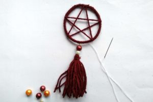 Sewing tassel to dreamcatcher pendant