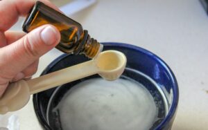 Adding essential oils to homemade mold and mildew cleaner