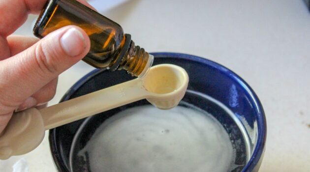 Adding essential oils to homemade mold and mildew cleaner