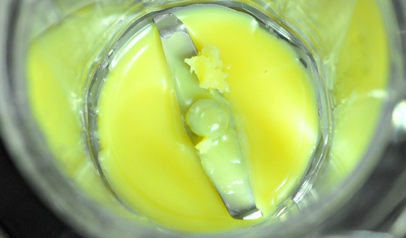Hardened face cream ingredients in a blender
