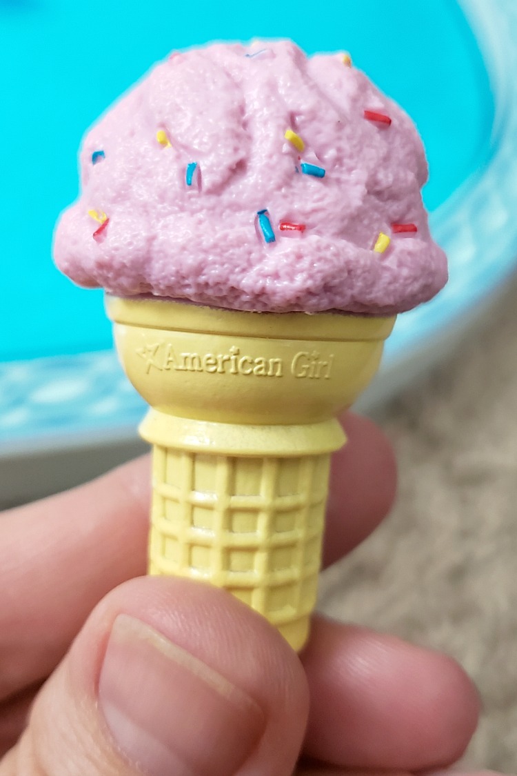 American Girl Pink Ice Cream Cone in front of swimming pool