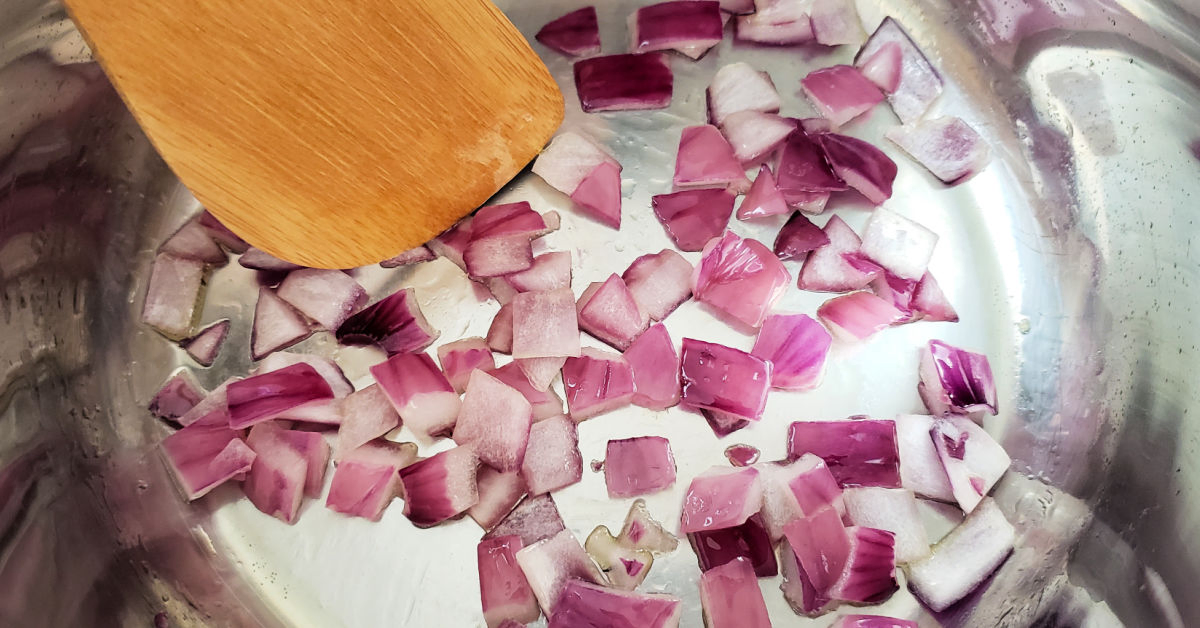 Red onions being sauteed in Instant Pot.