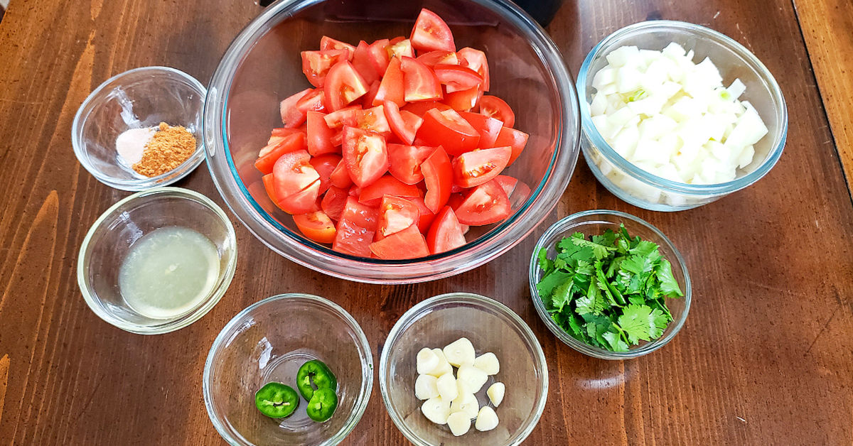 Salsa Ingredients: Tomatoes, onion, cilantro, garlic, jalapeno, lime juice, taco seasoning and sea salt.
