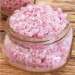 Pink Pop Rocks bath salts in a jar.