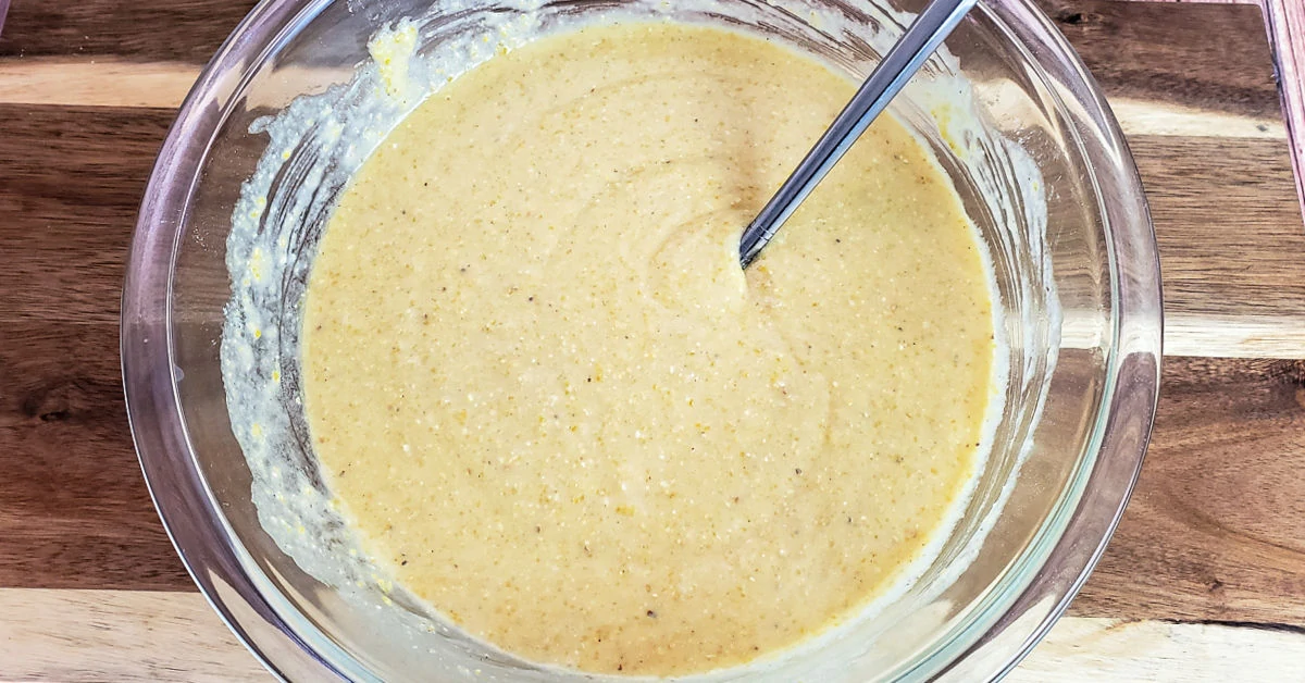 Milk and melted butter added to gluten free cornbread batter.