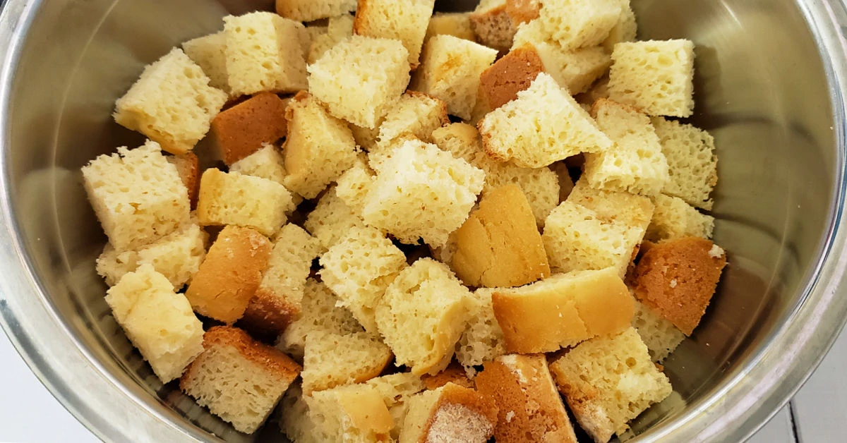 9 cups of gluten free bread cubes in a mixing bowl.