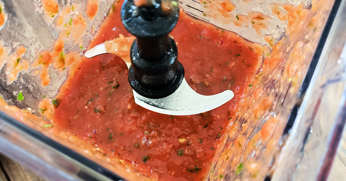 Mexican salsa blended together in blender pitcher.