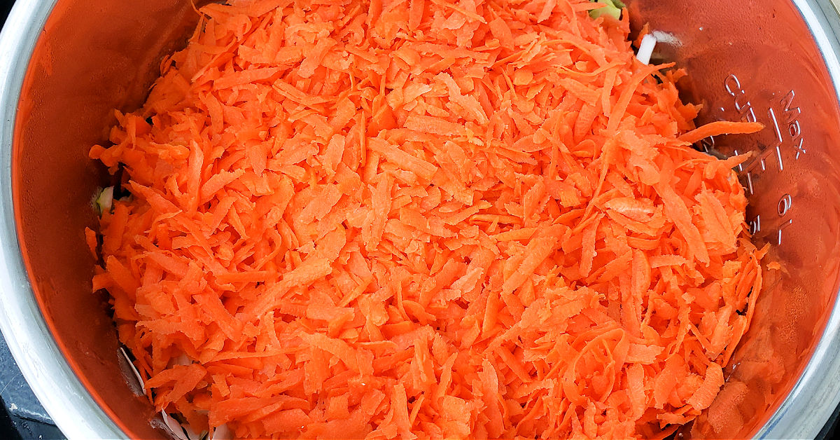 Shredded carrots added to Instant Pot.