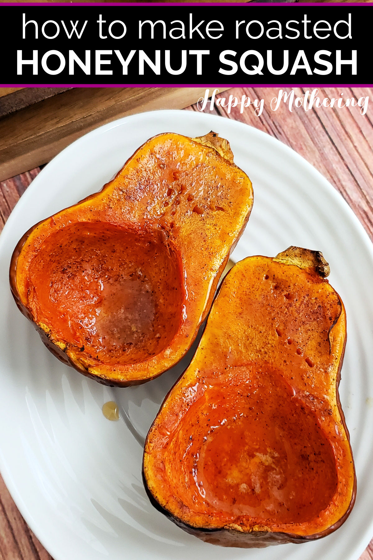 Two beautiful roasted honeynut squash halves on a white serving platter for dinner.
