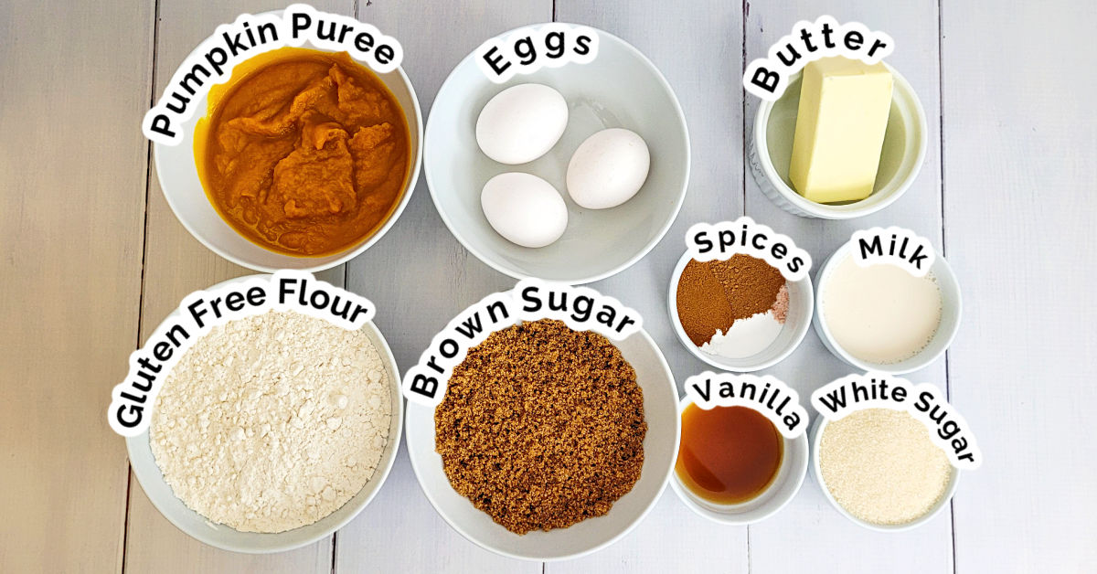 Ingredients for gluten free pumpkin bread measured out in bowls.