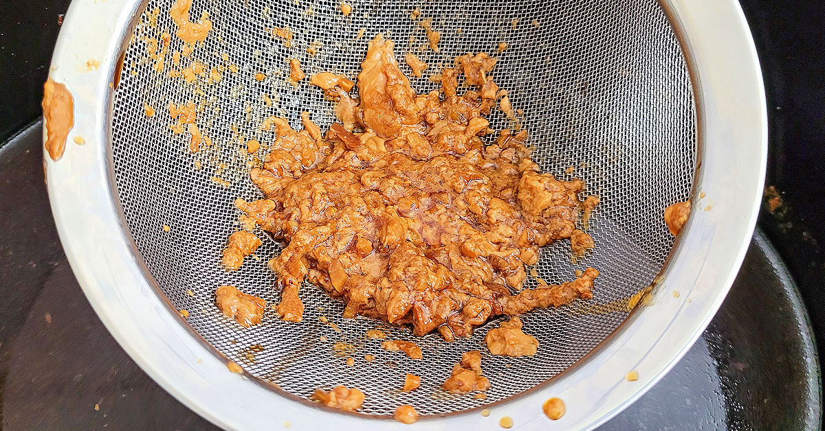 Teriyaki sauce strained through a fine mesh strainer to remove excess fat.